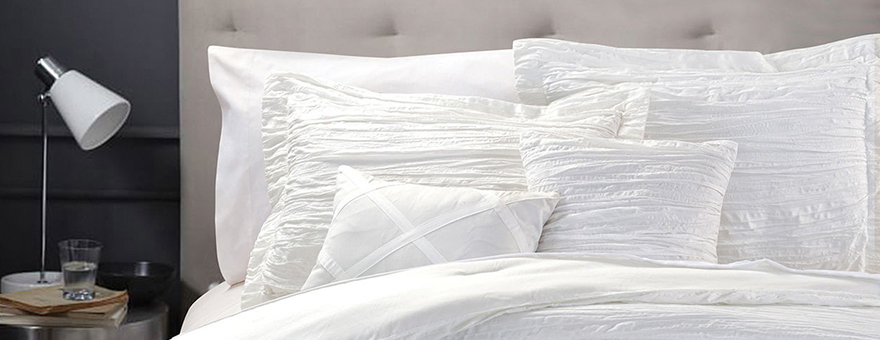 White comforter set on a bed